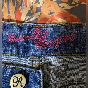 Rock & Roll Cowgirl Denim Jeans with Pink Stitching . 
size 28x34